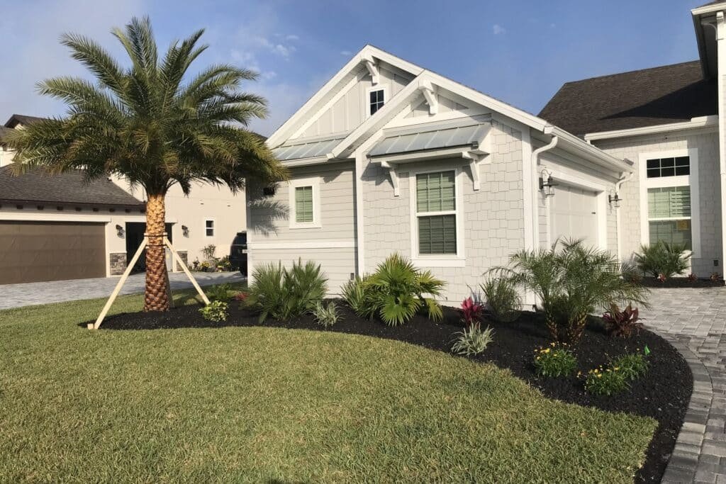 Landscaper in St. Johns FL creating custom outdoor living spaces, plant layouts, and beautiful landscape designs